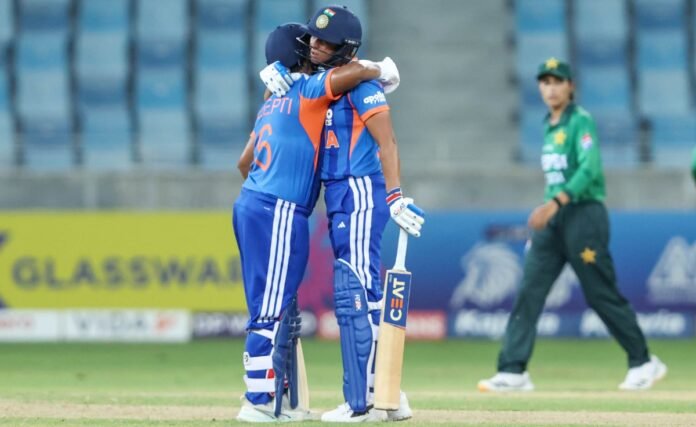 Deepti Sharma and Harmanpreet Kaur embrace during India’s Women’s Asia Cup match against Pakistan.